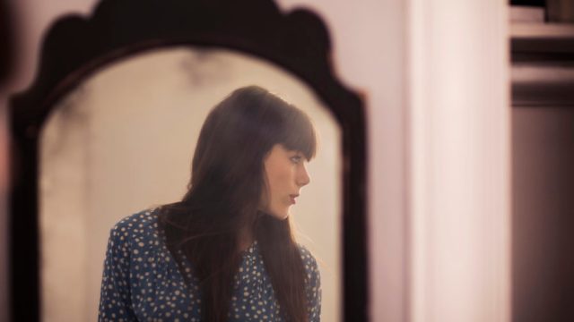 Image of woman in the mirror