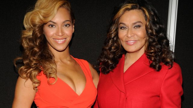 Beyonce and her mother Tina Knowles-Lawson, both wearing red