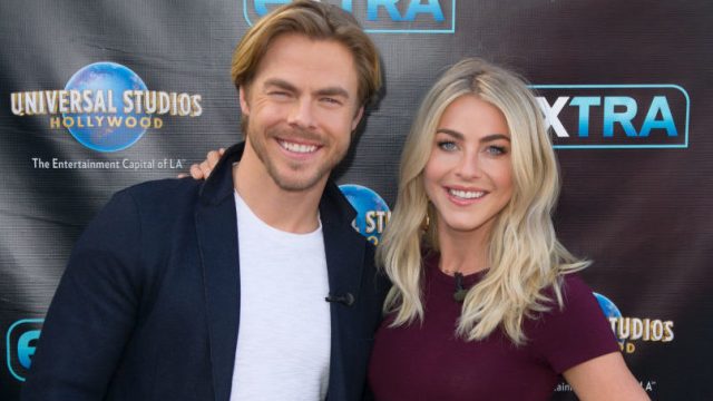 Derek Hough and Julianne Hough pose on the red carpet