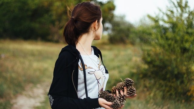 Woman walking through fields