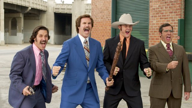 Will Ferredd, Paul Rudd, Davis Koechner, and Steve Carrell in character in Anchorman.