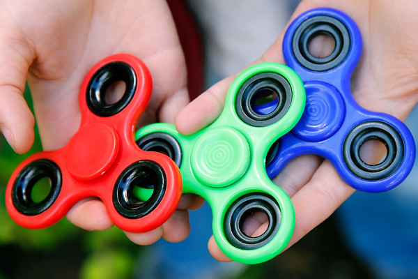 is planning to destroy 35 of fidget spinners, and Twitter is living for it - HelloGigglesHelloGiggles