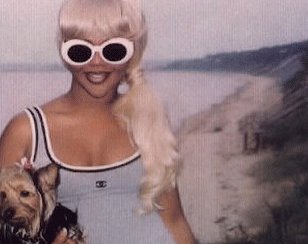 Lil' Kim at the grand opening of Chanel in Soho, NYC Dec 5th 2000 💿 White Chanel  sunglasses currently available at the shop. [ Sold ]