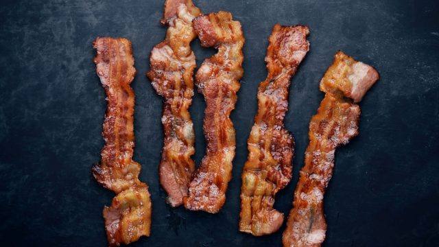 Bacon on a black table