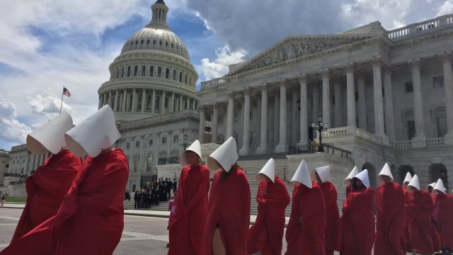 Handmaids outside the Capitol building