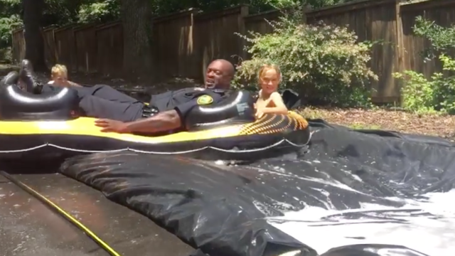 Image of cop on slip-and-slide