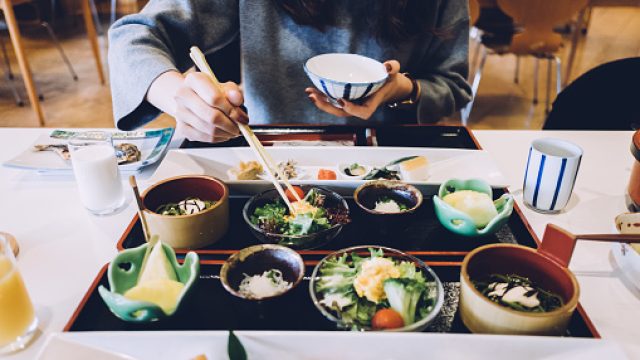 Woman eating vegan food