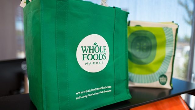 Reusable shopping bag with logo at Whole Foods Market grocery store in Dublin, California, June 16, 2017. On June 16, 2017, Amazon.com announced that it would acquire the upscale grocery chain. (Photo via Smith Collection/Gado/Getty Images).