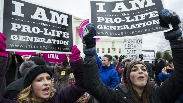 WASHINGTON, USA - JANUARY 27: Pro-Life demonstrators try to block Pro-Choice supporters in front of the Supreme Court during the annual March for Life on the anniversary of the historic Roe v. Wade Supreme Court ruling in Washington, USA on January 27, 2017.