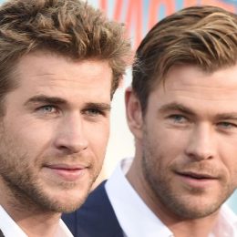 Actors Liam Hemsworth (L) and Chris Hemsworth arrive for the premiere of Warner Bros' "Vacation"