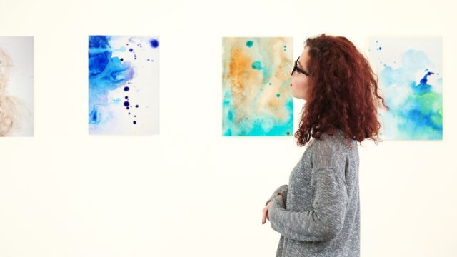 Woman in a gallery.