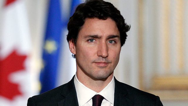 Canadian Prime minister, Justin Trudeau makes a statement during a press conference next to French President Francois Hollande at the Elysee Presidential Palace on November 29, 2015 in Paris, France. France will host climate change conference COP21 in Paris from November 30 to December 11, 2015.