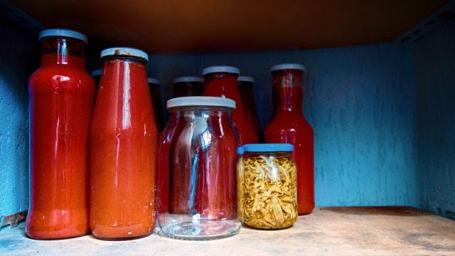 Cupboard full of tomato sauce and nothing else.