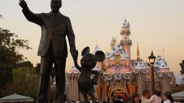 Walt Disney and Mickey Mouse Statue at Disneyland's Sleeping Beauty's Holiday Castle and "Believe In Holiday Magic" Fireworks spectacular held at Disneyland Resort