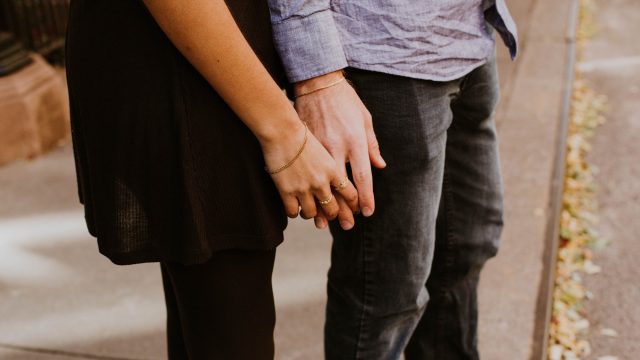 couple holding hands
