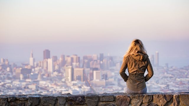 Woman sitting alone taking a break from dating.