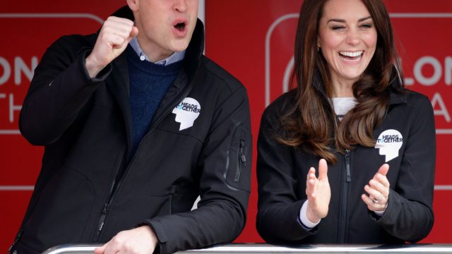 Prince William and Kate Middleton cheer on a crowd at London Marathon.