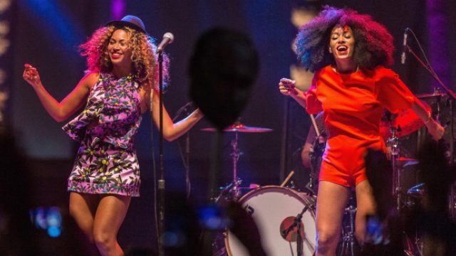 Beyonce (L) performs with her sister Solange onstage during day 2 of the 2014 Coachella Valley Music & Arts Festival at the Empire Polo Club on April 12, 2014 in Indio, California.