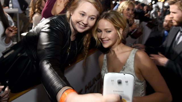 Fan Chelsea Boyce (L) takes a Wide Angle Selfie with actress Jennifer Lawrence using the new Samsung Galaxy Note 4