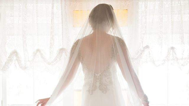 A photo of a bride in a veil
