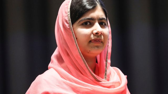 Activist Malala Yousafzai looks on during a UN ceremony honoring her