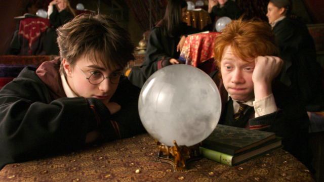 Image of Harry Potter and Ron Weasley in class