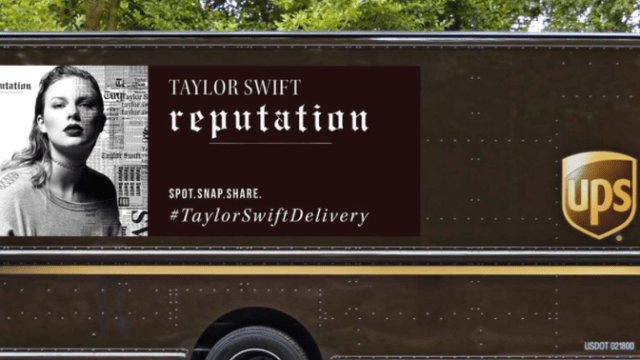 UPS truck with Taylor Swift's album cover plastered on it.
