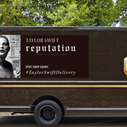 UPS truck with Taylor Swift's album cover plastered on it.