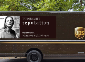 UPS truck with Taylor Swift's album cover plastered on it.