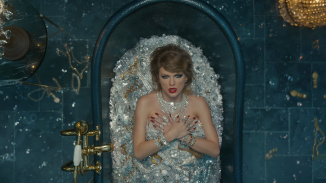 Taylor Swift in bathtub full of jewels from her music video "Look What You Made Me Do"