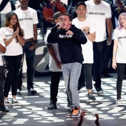Logic (C) performs onstage during the 2017 MTV Video Music Awards