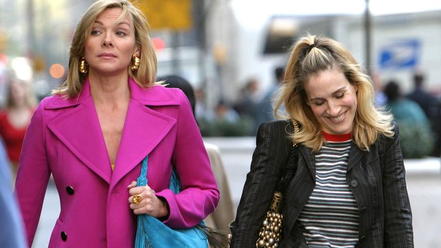 Kim Cattrall and Sarah Jessica Parker during Kim Cattrall and Sarah Jessica Parker On Location For "Sex And The City" at Saks Fifth Ave in New York, New York, United States. (Photo by James Devaney/WireImage)