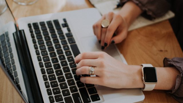woman-typing-on-laptop-keyboard