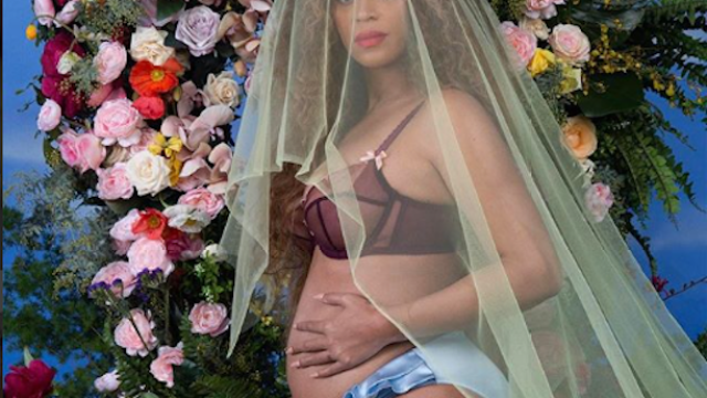 Beyoncé surrounded by flowers with pregnant belly