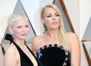 Michelle Williams (L) and Busy Philipps arrive at the 89th Annual Academy Awards at Hollywood & Highland Center on February 26, 2017 in Hollywood, California.
