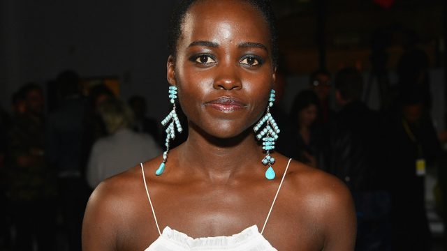 Actress Lupita Nyong'o poses for a photo at the Calvin Klein Collection fashion show during New York Fashion Week on September 7, 2017