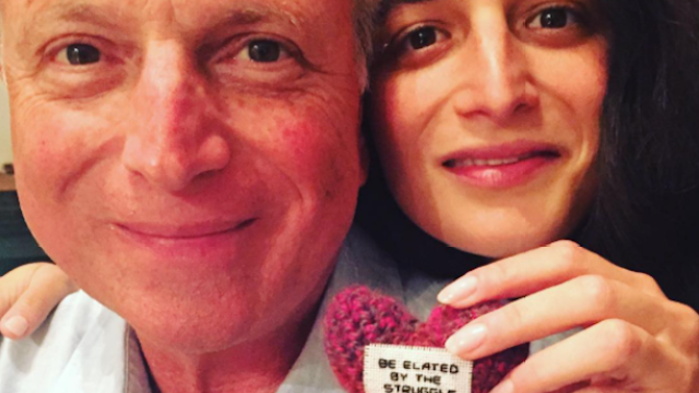 Father and daughter Ron and Jenny Slate with handmade cloth heart