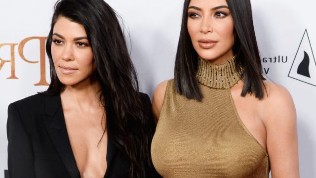 HOLLYWOOD, CA - APRIL 12: (L-R) Kim Kardashian and Kourtney Kardashian arrive to the Los Angeles premiere of 'The Promise' at TCL Chinese Theatre on April 12, 2017 in Hollywood, California. (Photo by Tara