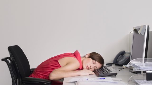 Office Worker Asleep at Desk