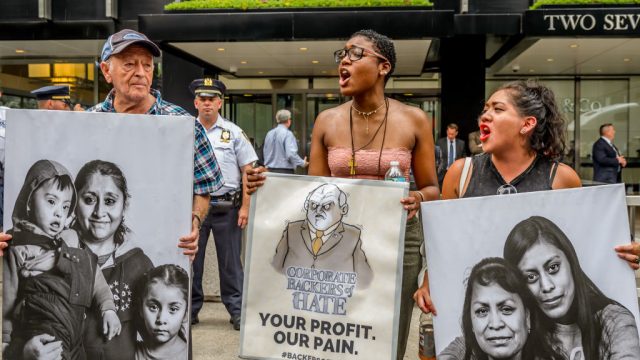 JP MORGAN CHASE HEADQUARTERS, NEW YORK, UNITED STATES - 2017/08/02: Hundreds of immigrants and allies in New York City protested outside JPMorgan Chase offices, calling on its complicity in Trumps anti-immigrant agenda, partiularly through its financing of private immigrant detention centers run by the GEO Group and CoreCivic. The Taken From Us protest featured powerful visual illustrations of the families separated by private immigrant detention centers, and thousands of empty pairs of shoes to symbolize relatives and friends detained in private immigration detention centers financed by JPMorgan Chase. (Photo by Erik McGregor/Pacific Press/LightRocket via Getty Images)