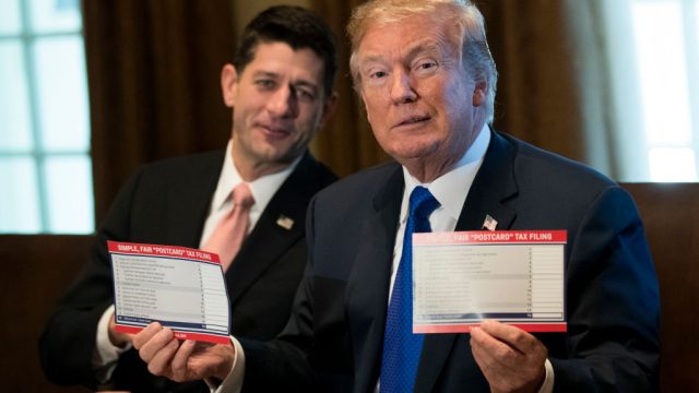 WASHINGTON, DC - NOVEMBER 02: Speaker of the House Paul Ryan looks on as President Donald Trump speaks about tax reform legislation in the Cabinet Room at the White House, November 2, 2017 in Washington, DC. On Thursday, Republican lawmakers unveiled their plans for a massive rewrite of the U.S. tax code. (Drew Angerer/Getty Images)