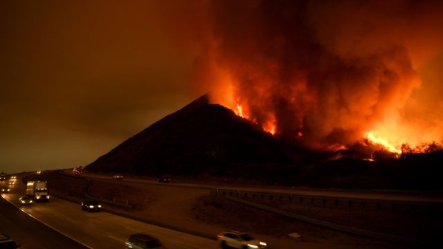 VENTURA, CA - DECEMBER 6: The Thomas Fire burns along the Northbound 101 freeway on December 6, 2017 in Ventura, California. (Photo by Wally Skalij/Los Angeles Times via Getty Images)