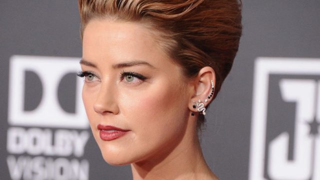 HOLLYWOOD, CA - NOVEMBER 13: Actress Amber Heard attends the Los Angeles Premiere of Warner Bros. Pictures' "Justice League" at Dolby Theatre on November 13, 2017 in Hollywood, California.