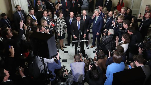 Speaker of the House Paul Ryan is joined by House Republican leaders while talking to reporters following passage of the Tax Cuts and Jobs Act