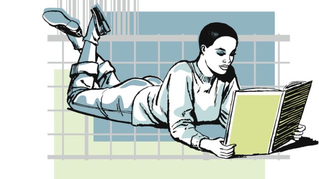 woman reading on floor