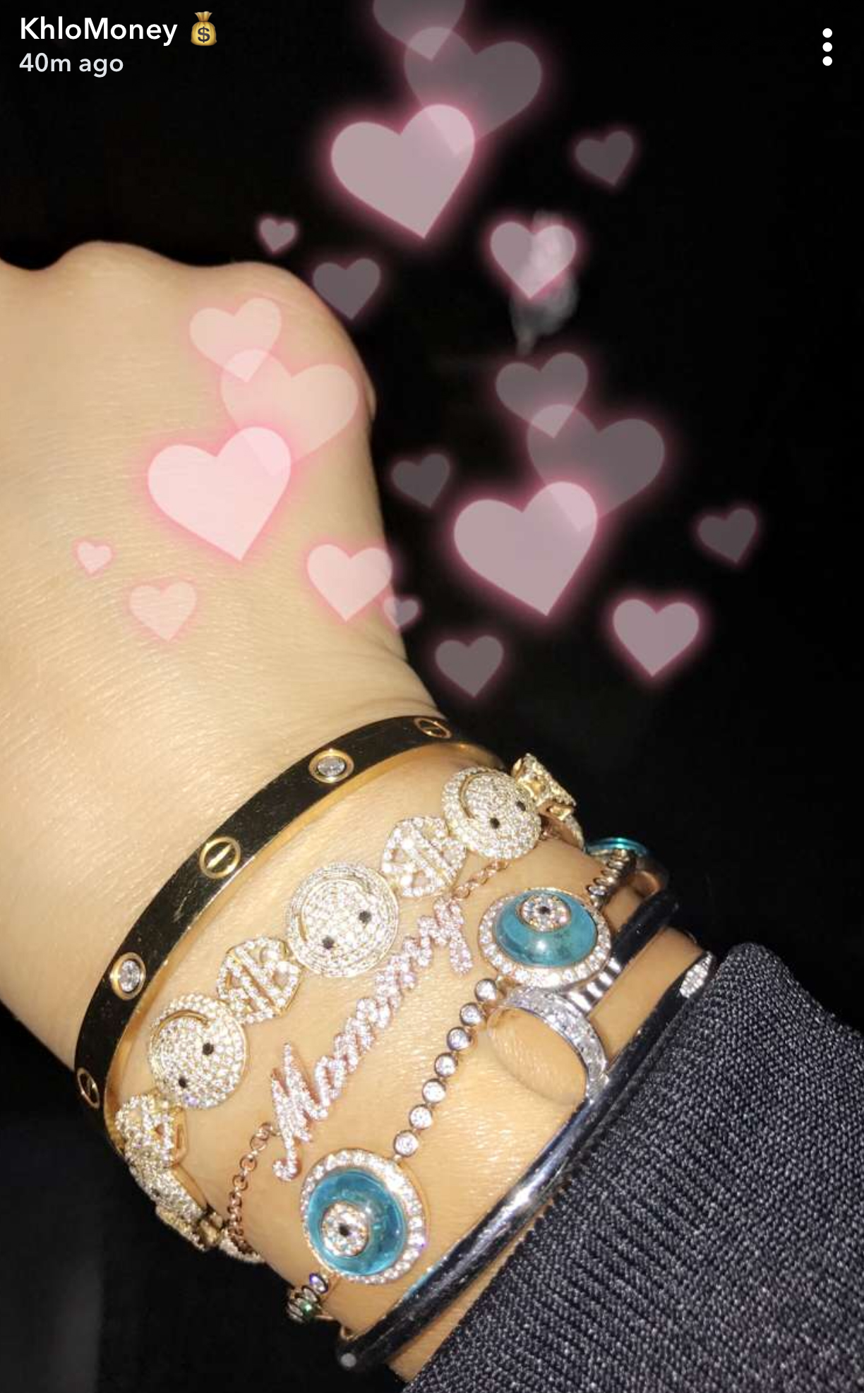 Pregnant Khloé Kardashian flashed her Mommy bracelet on  SnapchatHelloGiggles