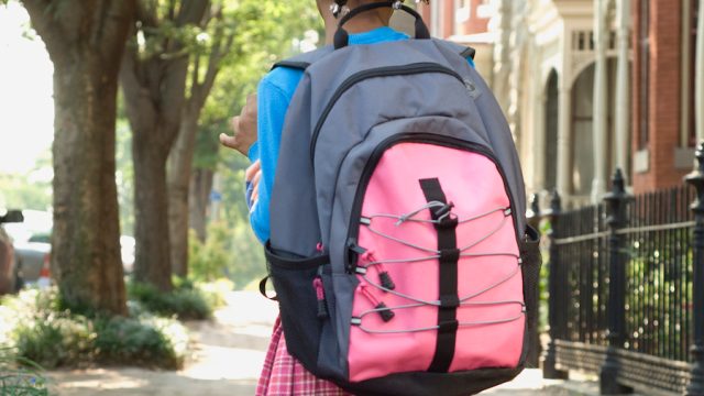 Young girl walking home