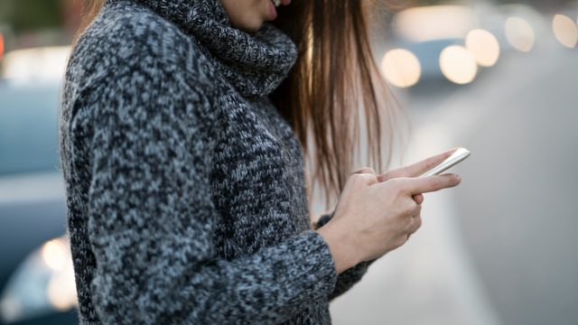 Picture of Woman Using Phone