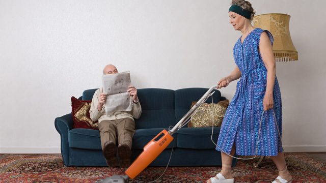 Image of retired woman doing housework