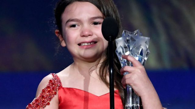 SANTA MONICA, CA - JANUARY 11: Actor Brooklynn Prince accepts Best Young Actor/Actress for 'The Florida Project' onstage during The 23rd Annual Critics' Choice Awards at Barker Hangar on January 11, 2018 in Santa Monica, California